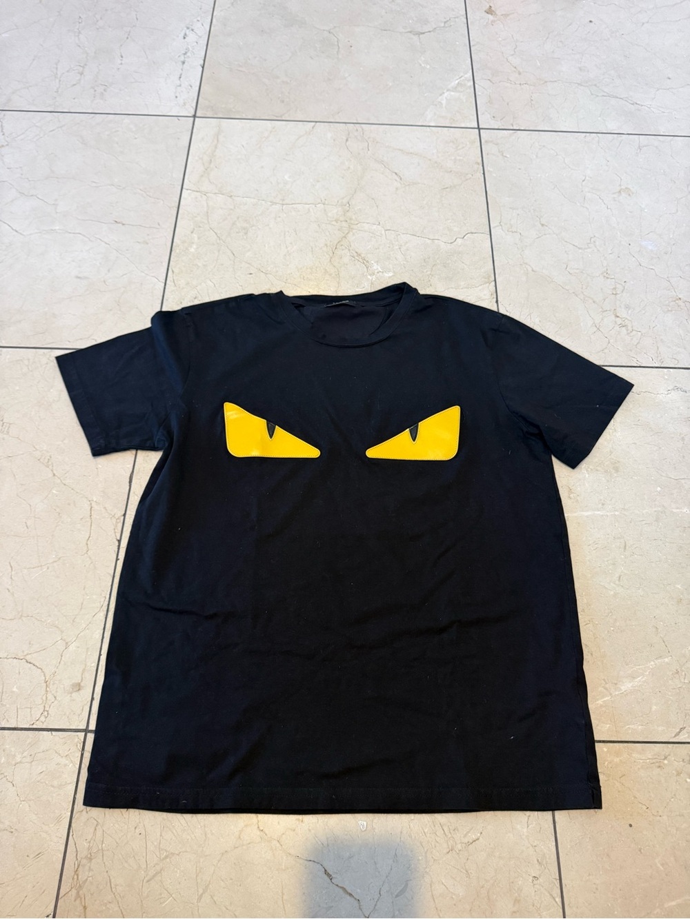 Fendi Men's Black Graphic Tee with Yellow Eye Design